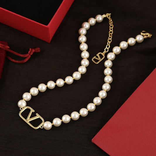**Pearl Charm Necklace – Elegant Gold-Tone Statement Necklace for Women**